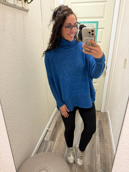 Fawn Hacci Turtleneck Sweater