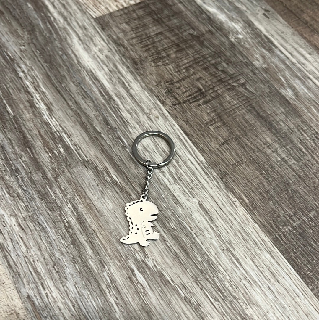 Fat head dinosaur keychain